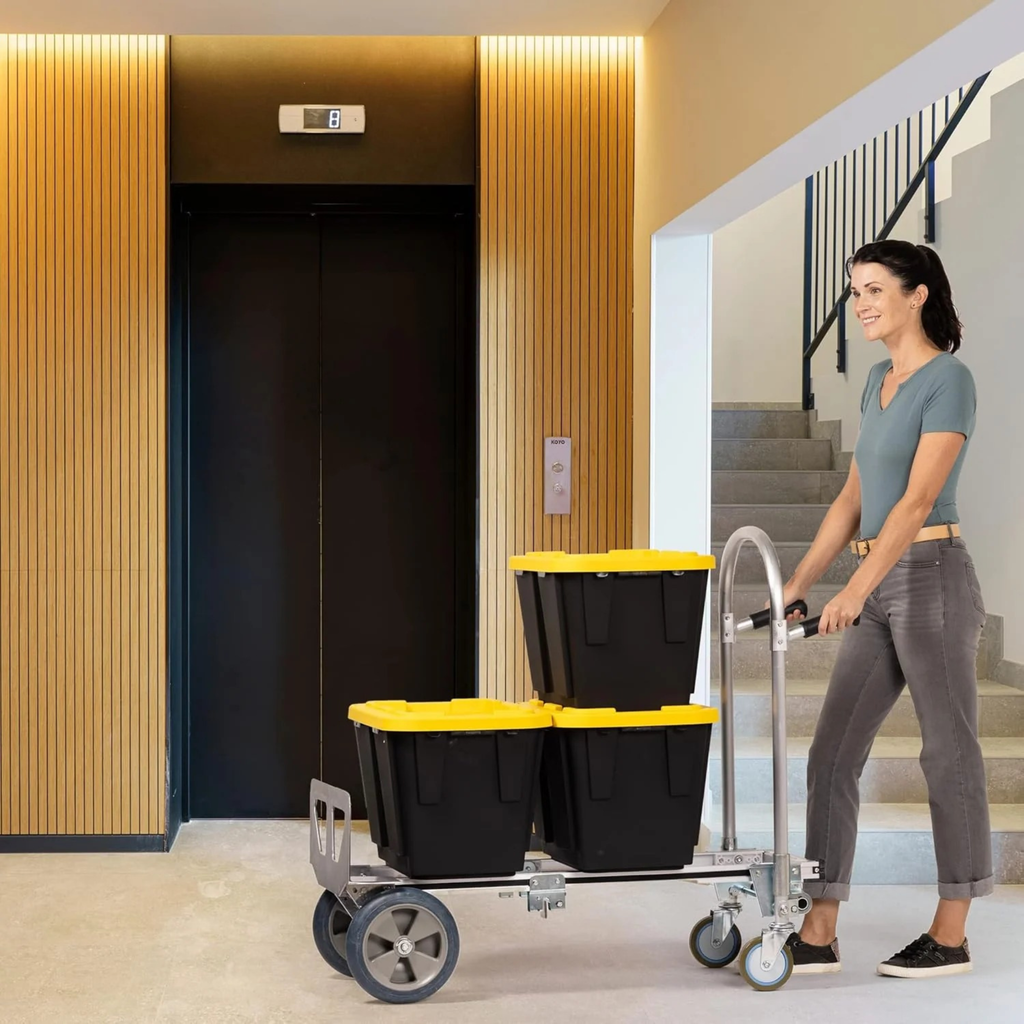 Junior convertible aluminum hand truck in use moving boxes in warehouse